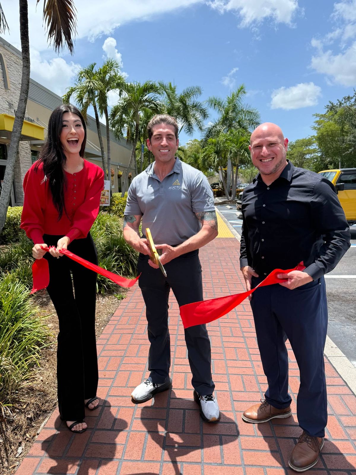 Ribbon cutting at an Auctus Group restaurant