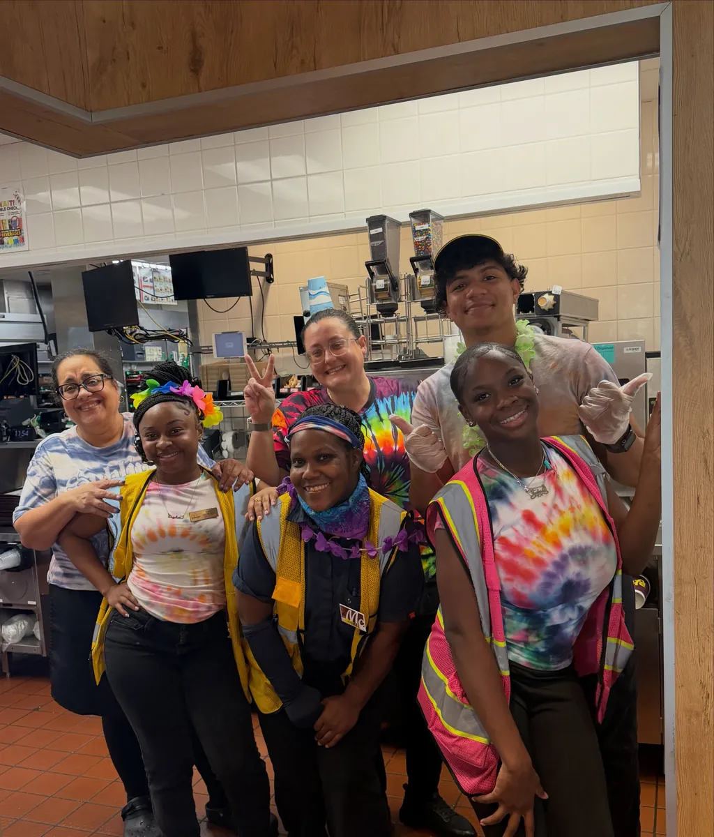 Crew in tie-dye outfits for Tie Dye Tuesday