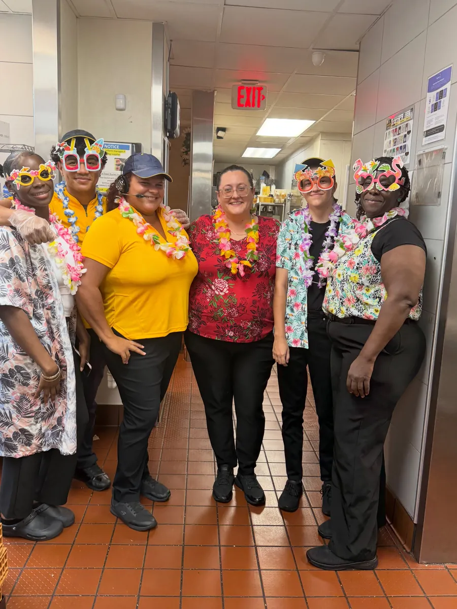 Crew in Hawaiian shirts and leis for Maui Monday