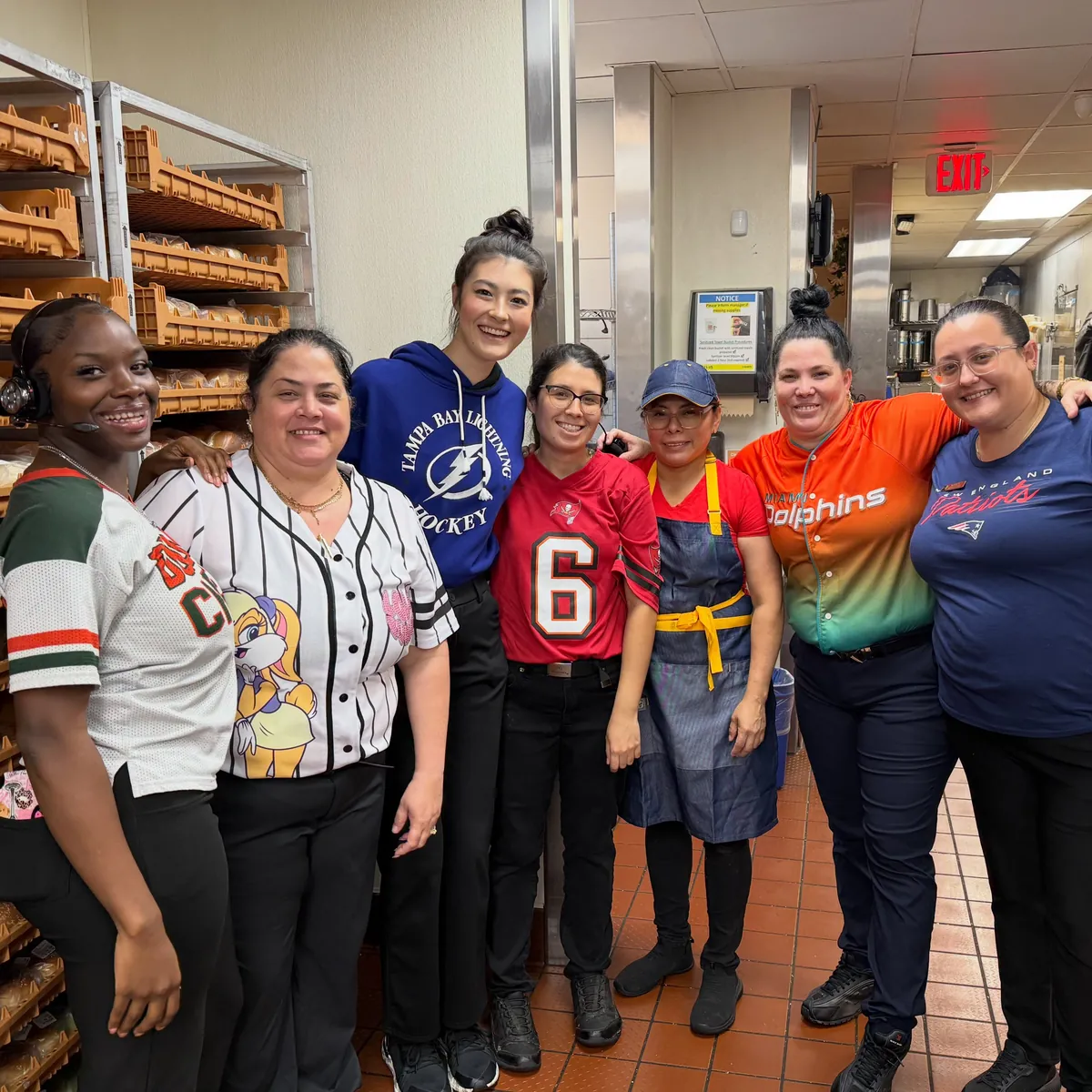 Crew in sports jerseys for Superfan Sunday