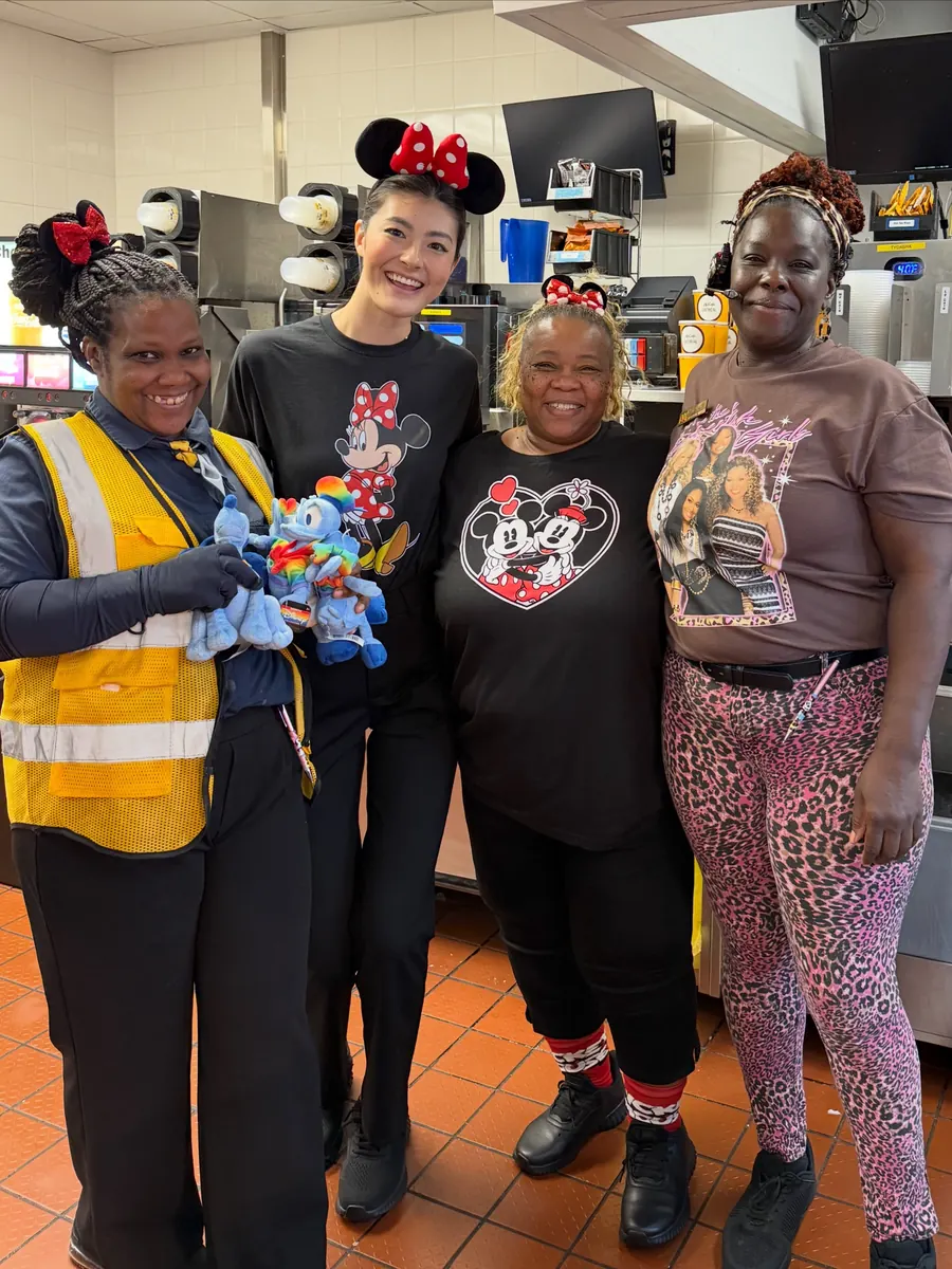 Crew in Mickey-themed shirts during People Week