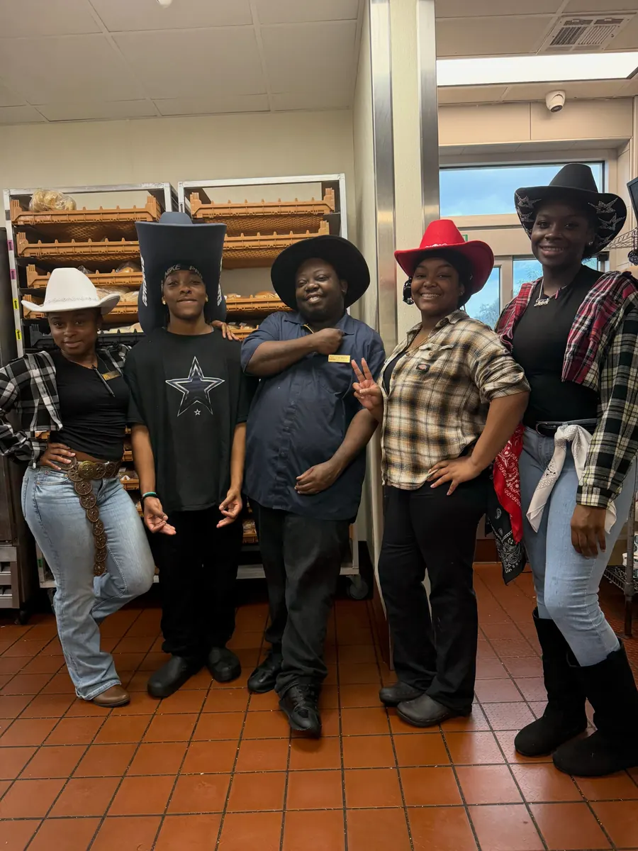 Crew in cowboy hats and plaid for Wild West Wednesday