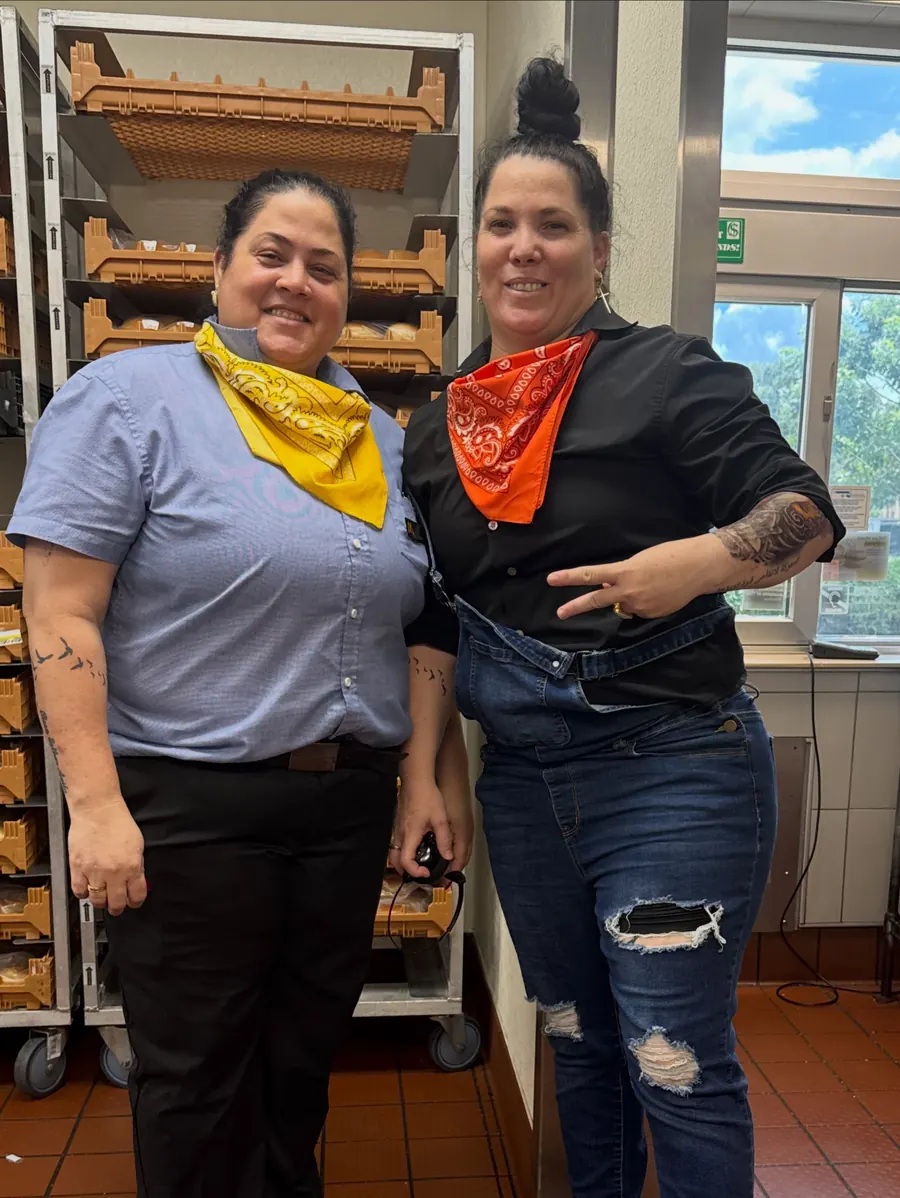 Two crew members in neckerchiefs for Wild West Wednesday